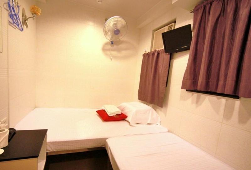 Cynthia'S Inn Kowloon Stadt Zimmer foto
